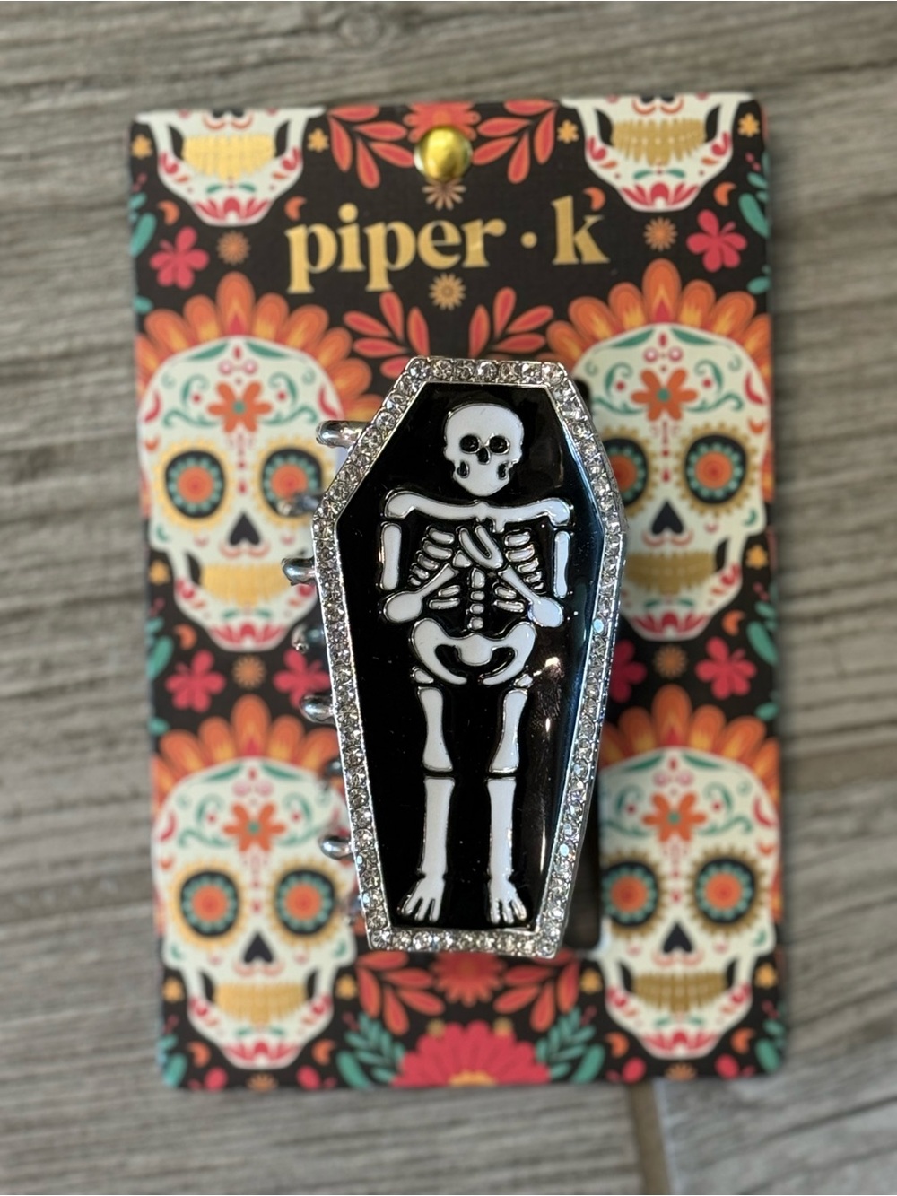 Enamel Piper K skeleton coffin Halloween hair clip accessory